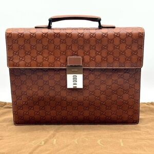 Gucci Embossed Monogram Brown Leather Briefcase with Silver Lock